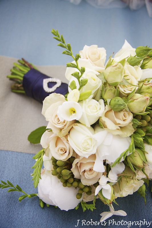 Bridal bouquet with roses and lysianthas - wedding photography sydney
